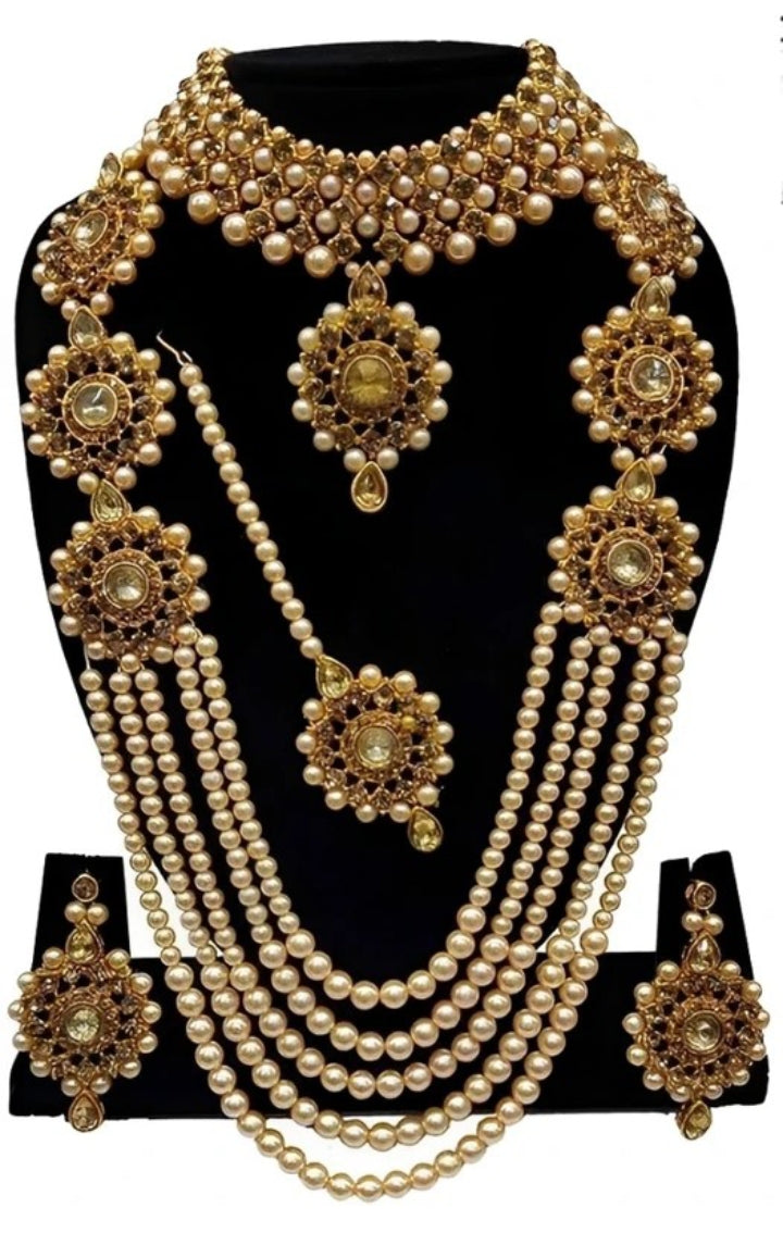 Close-up view of gold-plated alloy necklace with kundan stones and detailed design