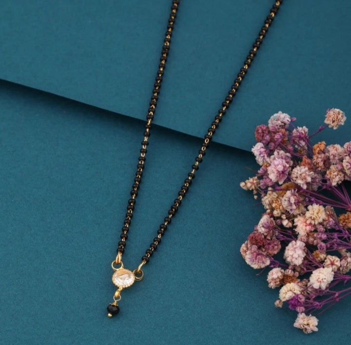 Stylish daily wear gold plated mangalsutra with matching earrings